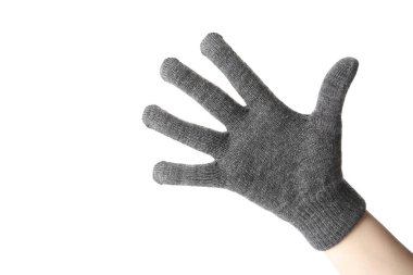 Beyaz arka planda gri yün eldivenli kadın, yakın plan. Kış giysileri