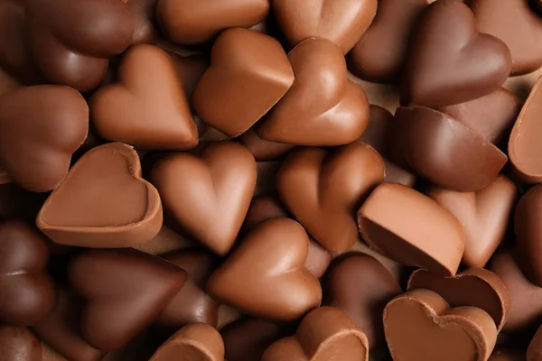 Smaklig Hjärtformad Choklad Godis Som Bakgrund Ovanifrån Alla Hjärtans Dag — Stockfoto