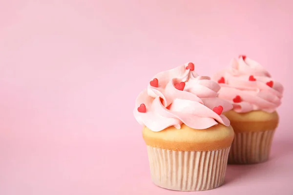 Tasty Cupcakes Heart Shaped Sprinkles Pink Background Space Text Valentine — Φωτογραφία Αρχείου