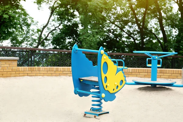 Children Playground Bright Butterfly Shaped Spring Rider Roundabout — Stok fotoğraf