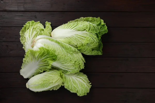 Fresh Ripe Chinese Cabbages Dark Wooden Table Fat Lay Space — Stok Foto
