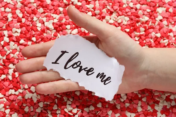 Woman Holding Piece Paper Handwritten Phrase Love Heart Shaped Sprinkles — Zdjęcie stockowe