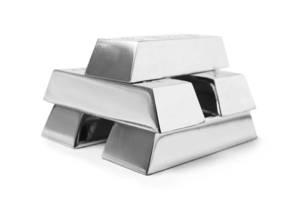 Stack of shining silver bars isolated on white