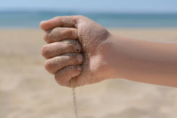 Child Pouring Sand Hand Beach Closeup Fleeting Time Concept — Fotografia de Stock