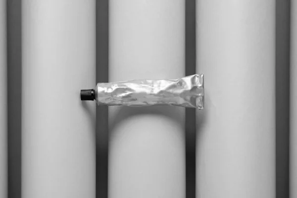 Tube Glue Grey Paper Rolls Top View — 스톡 사진