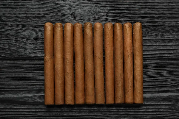 Many Cigars Black Wooden Table Flat Lay — 图库照片