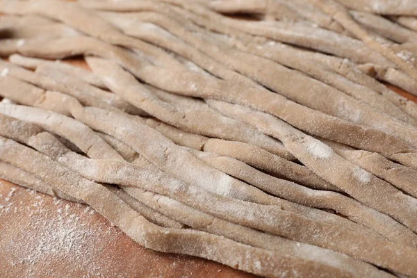 Uncooked Homemade Soba Buckwheat Noodles Wooden Table Closeup — Stock Photo, Image