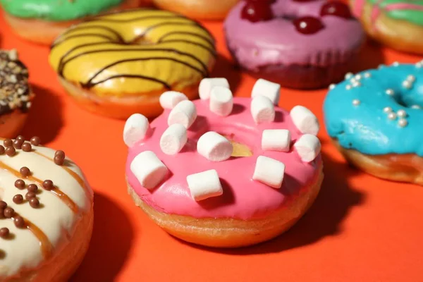 Sweet Tasty Glazed Donuts Coral Background Closeup — Photo