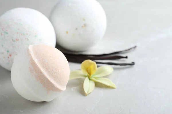 Fragrant Bath Bombs Vanilla Sticks Flower Light Grey Table Closeup — Fotografia de Stock