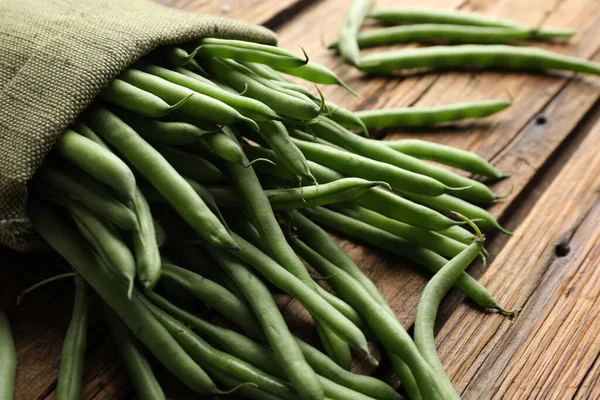 Fresh Green Beans Bag Wooden Table Closeup — Stok fotoğraf