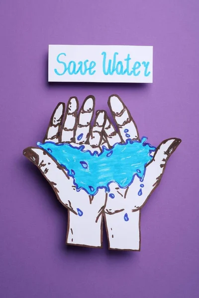 Water Concept Hands Water Paper Figure Card Violet Background Top — Foto de Stock