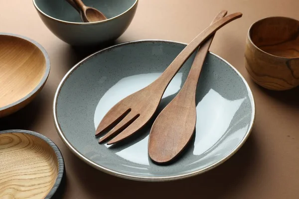 Stylish Empty Dishware Wooden Cutlery Brown Background — Φωτογραφία Αρχείου