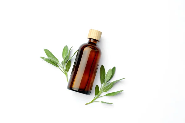 Bottles Essential Sage Oil Twigs White Background Top View — Fotografia de Stock