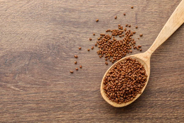 Spoon Buckwheat Tea Granules Wooden Table Top View Space Text — Foto de Stock