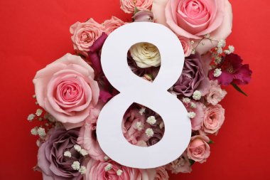 8 March greeting card design with beautiful pink flowers on red background, flat lay. International Women's day