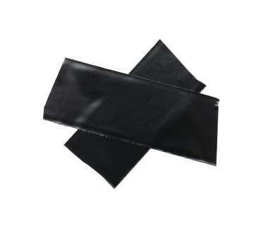 Cross of black insulating tape isolated on white, top view