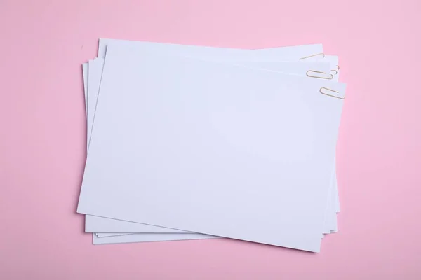 Sheets Paper Clips Pink Background Top View — Stockfoto