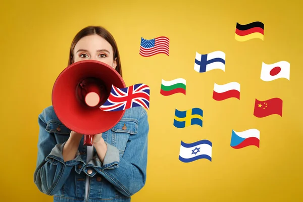 Portrait Interpreter Megaphone Flags Different Countries Yellow Background — Stockfoto