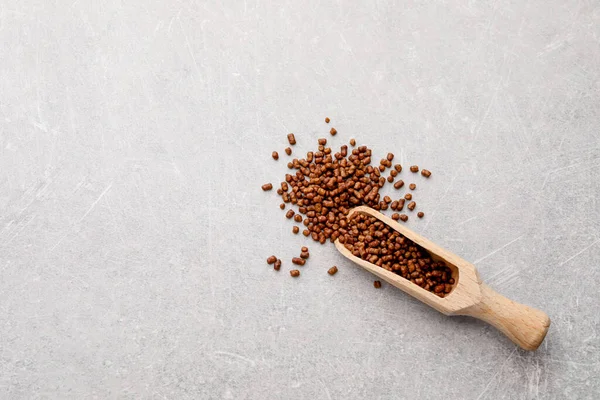 Scoop Buckwheat Tea Granules Light Grey Table Top View Space — Foto de Stock