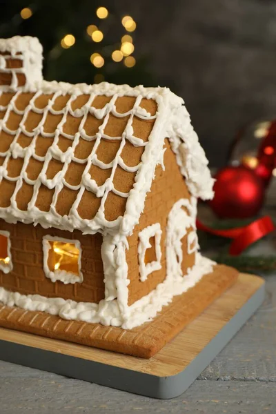 Beautiful Gingerbread House Decorated Icing Grey Wooden Table Closeup — Foto Stock