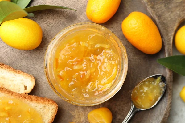 Delicious Kumquat Jam Tasty Toasts Fresh Fruits Wooden Board Flat — стоковое фото