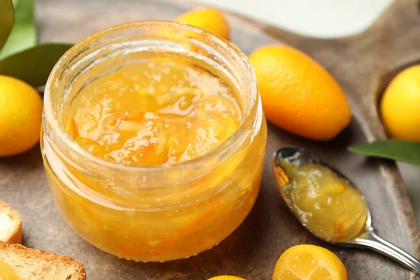 Delicious Kumquat Jam Jar Fresh Fruits Wooden Board Closeup — Stock Fotó