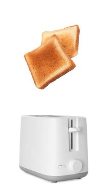 Ekmek kızartma makinesinden beyaz arkaplanda fırlıyor.