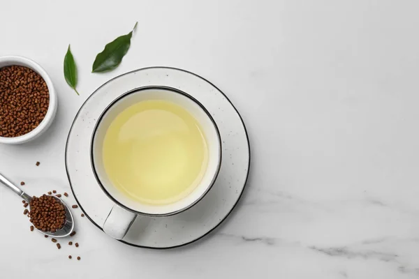 Cup Buckwheat Tea Granules White Marble Table Flat Lay Space — Stockfoto