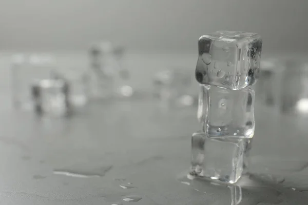 Crystal Clear Ice Cubes Water Drops Grey Table Closeup Space — Stock Photo, Image