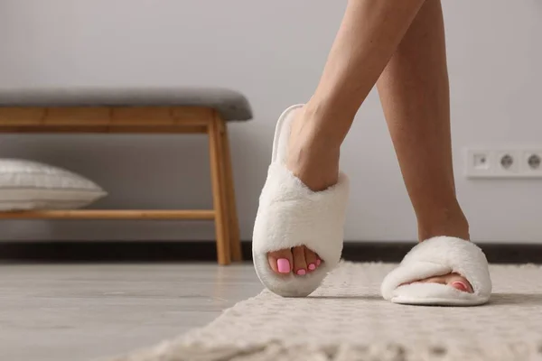 Woman Wearing White Soft Slippers Indoors Closeup Space Text — Zdjęcie stockowe