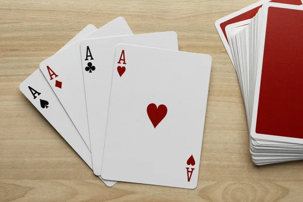 Four Aces Deck Playing Cards Wooden Table Flat Lay — 图库照片