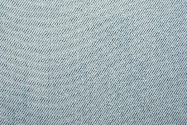 背景にライトブルーのジーンズの質感 クローズアップ — ストック写真