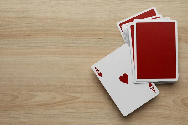 Deck Playing Cards Wooden Table Flat Lay Space Text — Zdjęcie stockowe