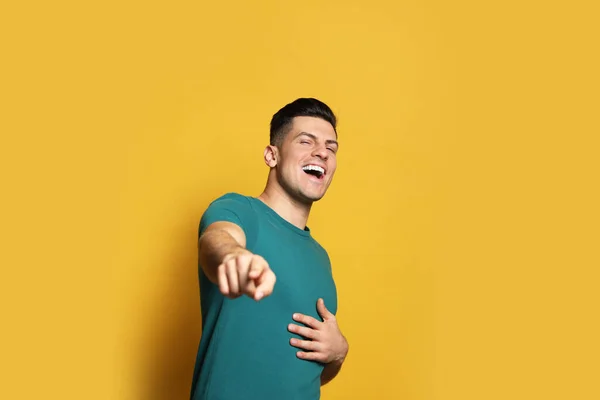 Handsome Man Laughing Yellow Background Funny Joke — Stock Photo, Image