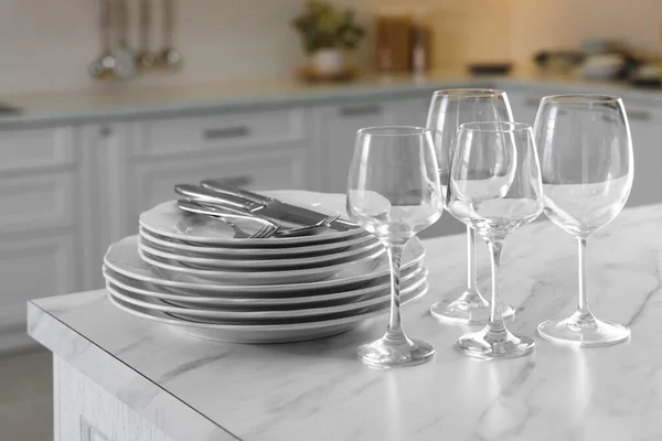 Different Clean Dishware Cutlery Glasses White Marble Table Kitchen — Stock Fotó