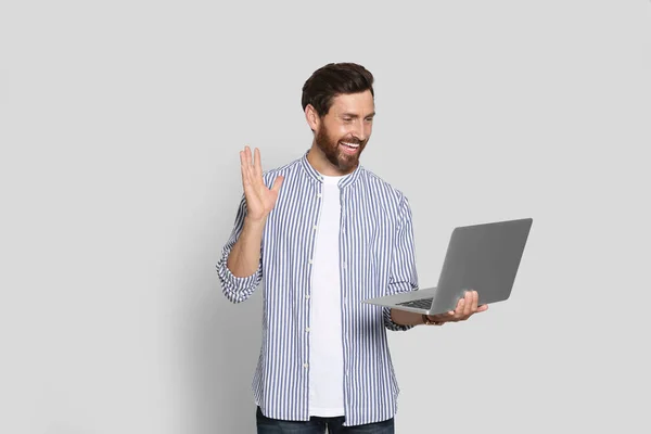 Emotional Bearded Man Laptop Light Background — Photo