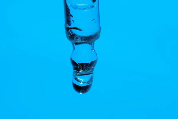 Dripping Face Serum Pipette Blue Background Closeup — Stock Photo, Image