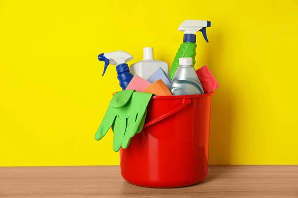 Bucket Different Cleaning Supplies Wooden Floor Yellow Wall — Stock Photo, Image