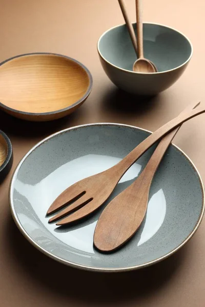 Stylish Empty Dishware Wooden Cutlery Brown Background — Φωτογραφία Αρχείου