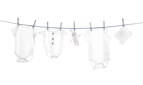 Different Baby Clothes Toy Drying Laundry Line White Background — Stockfoto