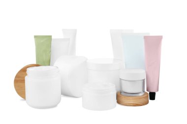 Set of different creams on white background