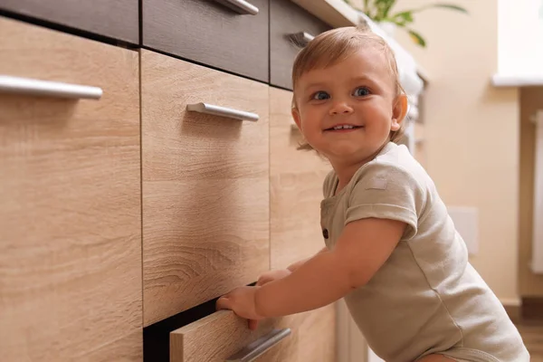 Little Child Exploring Drawer Indoors Dangerous Situation — Foto de Stock