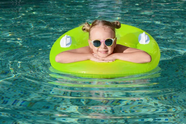 Happy Little Girl Inflatable Ring Outdoor Swimming Pool Sunny Day — 스톡 사진