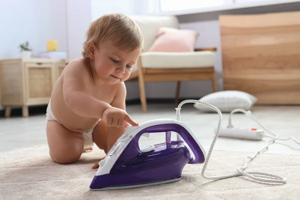 Cute Baby Playing Iron Floor Home Dangerous Situation — 스톡 사진