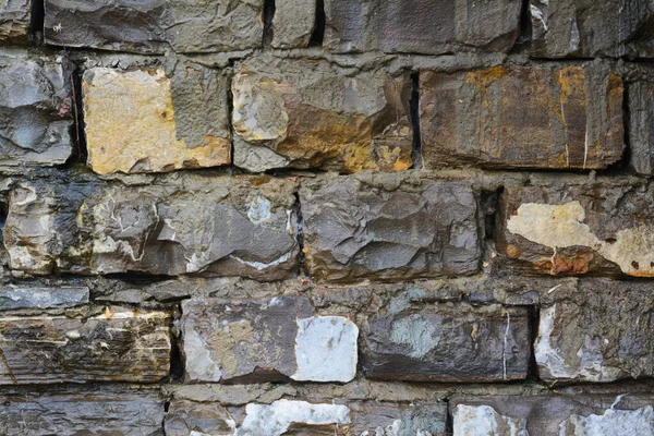 Τοίχος Διαφορετικά Θραύσματα Πέτρας Φόντο Closeup — Φωτογραφία Αρχείου
