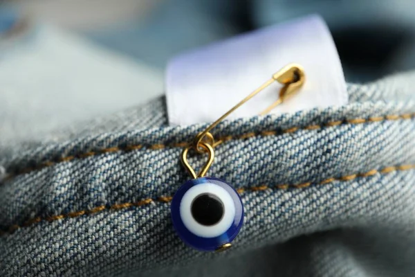 Evil Eye Safety Pin Denim Clothing Closeup — Stock Photo, Image