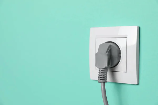 Power Socket Inserted Plug Turquoise Wall Space Text Electrical Supply — Fotografia de Stock
