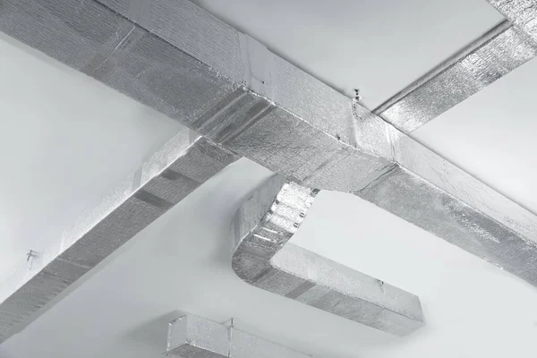 Ceiling with ventilation system indoors, low angle view