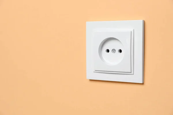 Power Socket Pale Orange Wall Space Text Electrical Supply — Fotografia de Stock
