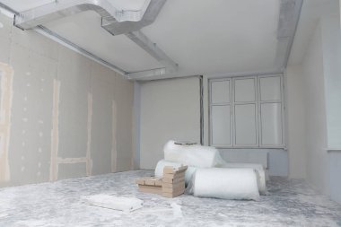 Building materials in room prepared for renovation